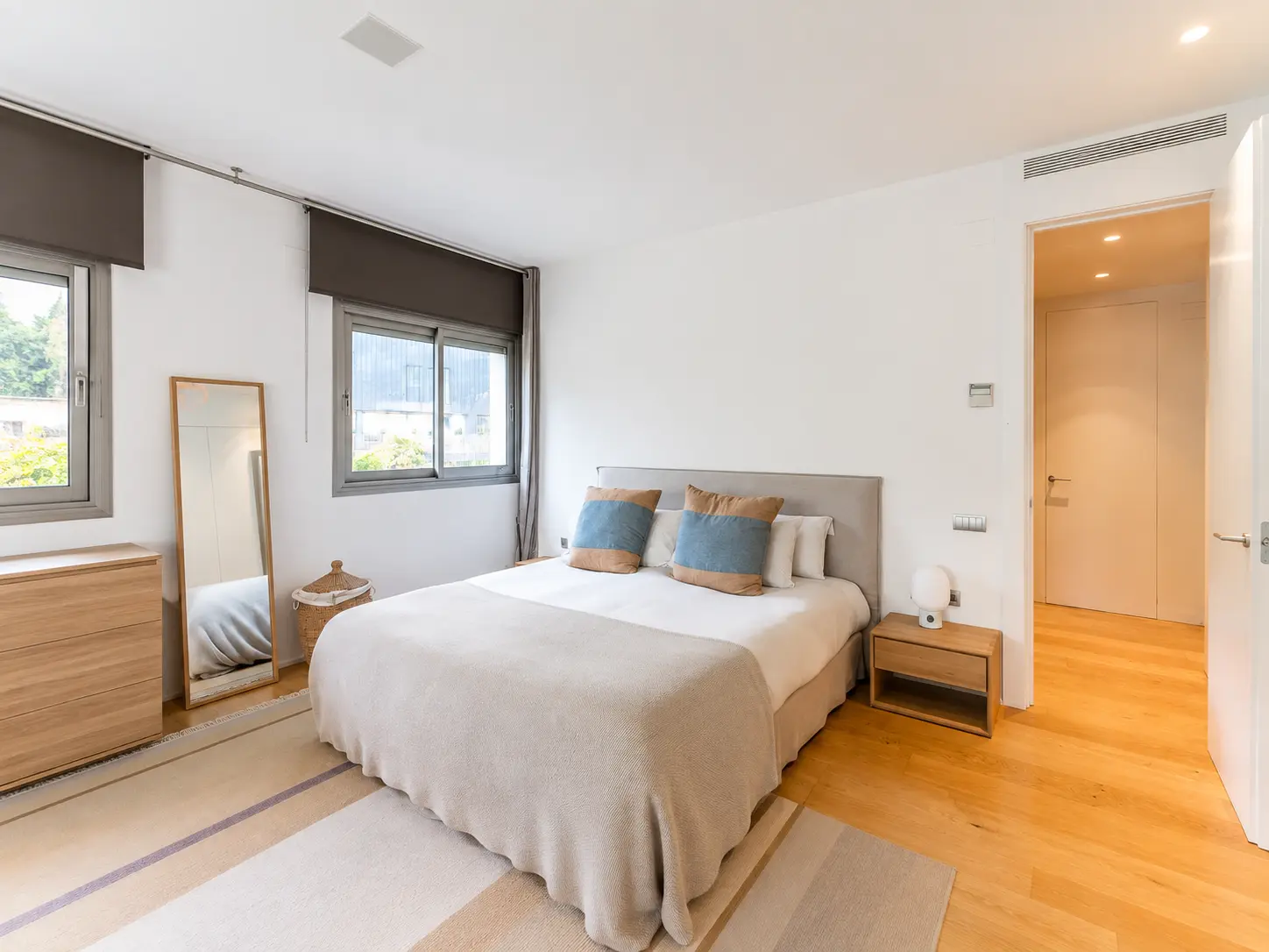 Second bedroom with natural light and terrace access