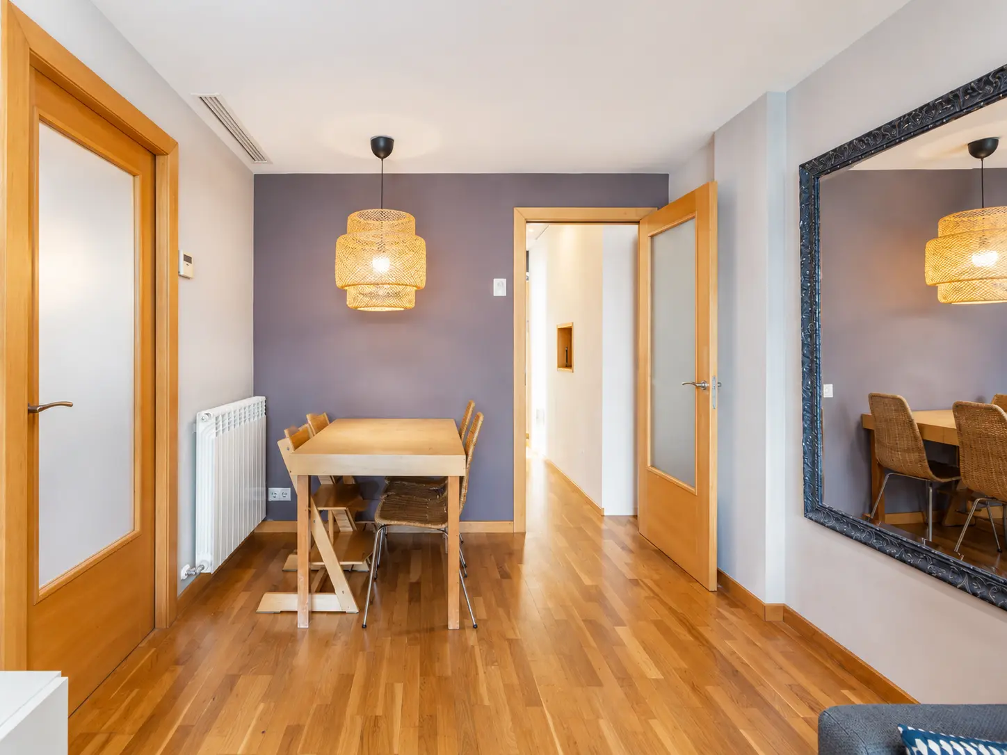 Dining area with hallway to the bedrooms
