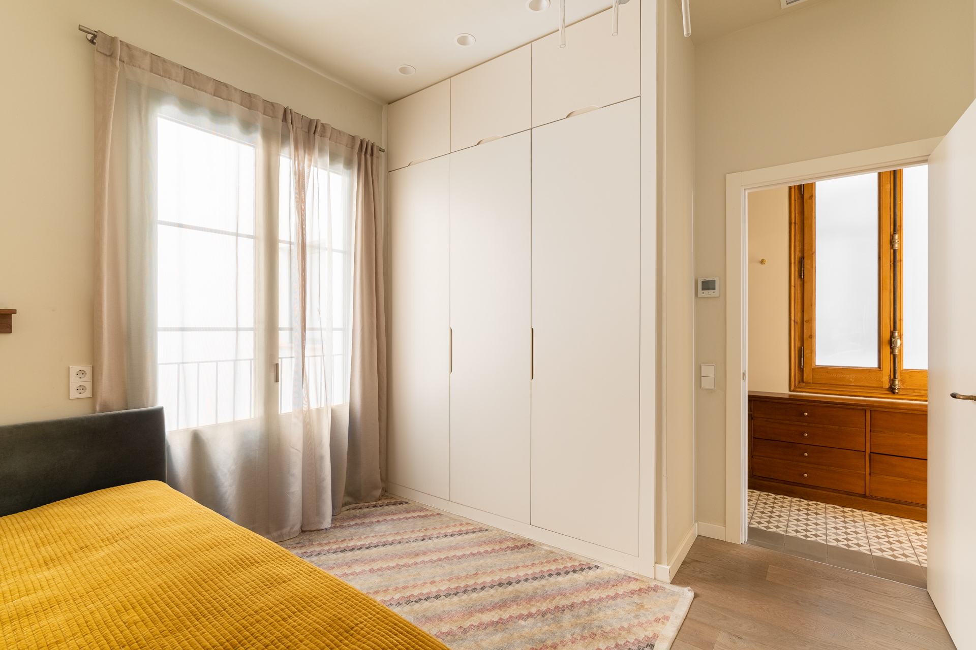 Bedroom with fitted wardrobes and en-suite