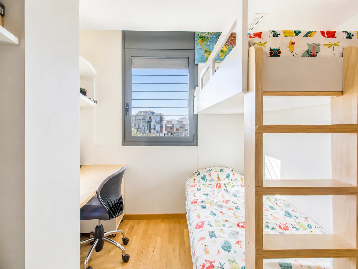 Third bedroom with bunk beds and desk