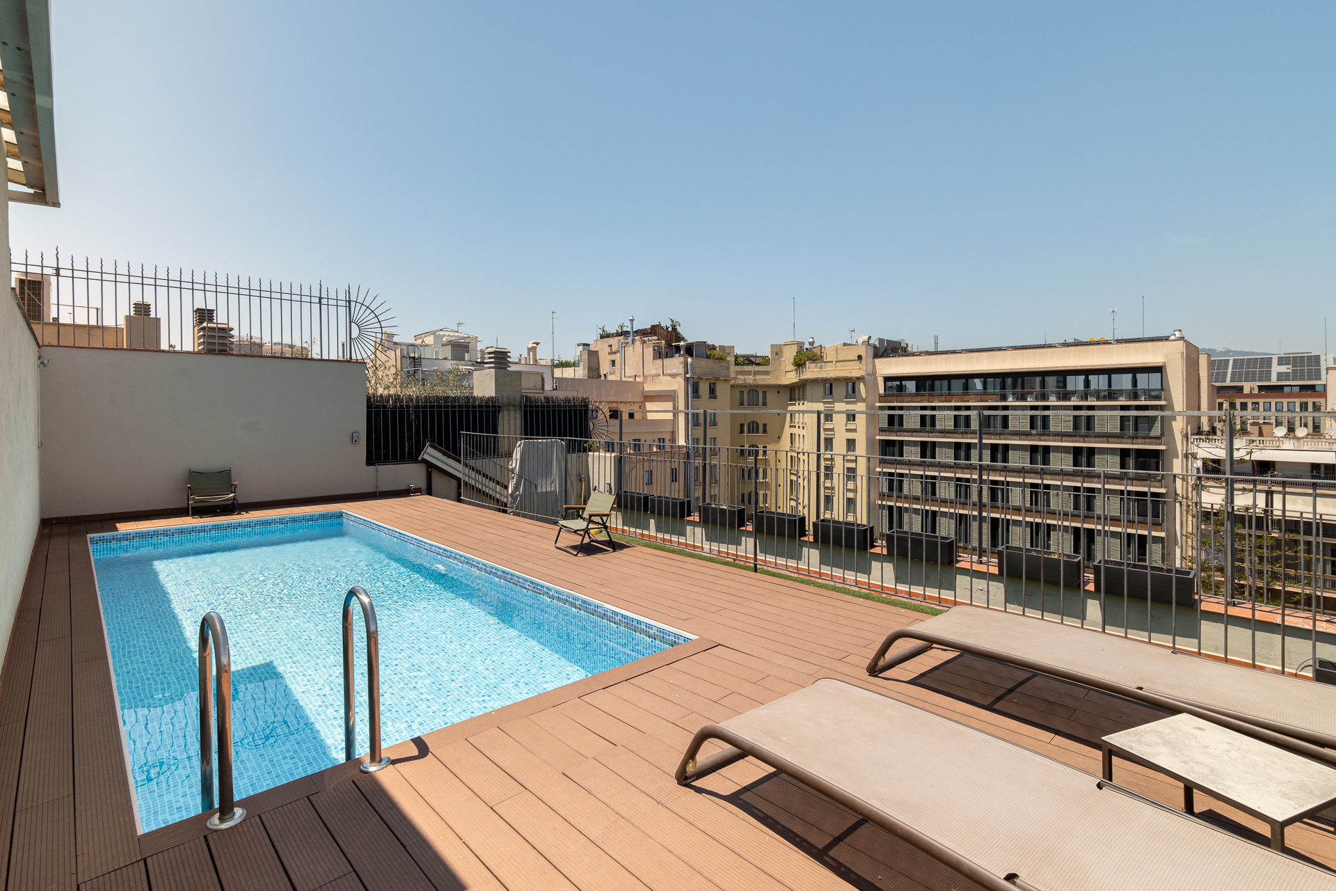 Rooftop pool terrace with city views